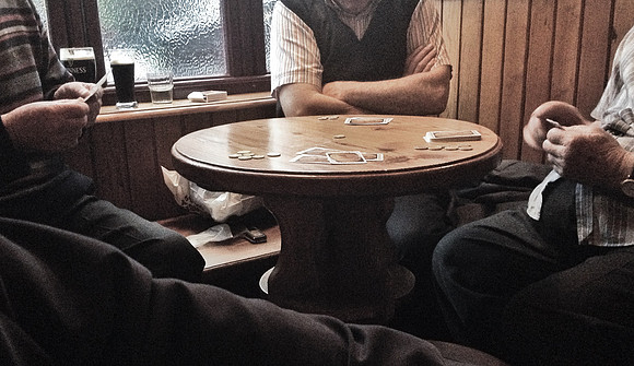 Irishmen playing cards